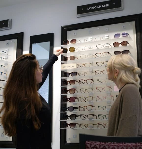 Customers choosing glasses