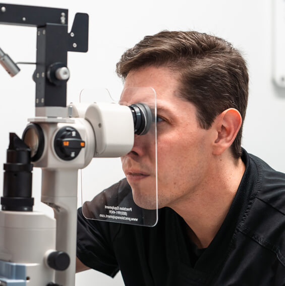 Eye Doctor Conducting Eye Exam